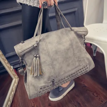 2017 Europe and America women's handbags fashion vintage scrub tassel rivets handbag messenger bag women's casual big bag bolsos