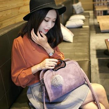 2017 new women handbags, simple fashion flap, hair ball ornaments messenger bag, Korean version shoulder bag.