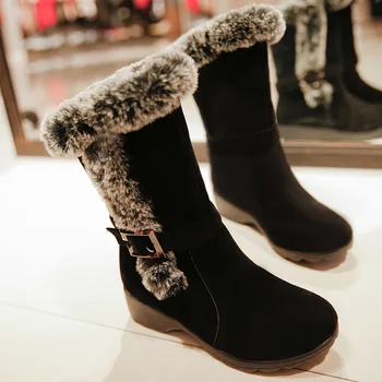 The new fashion trends the dollar head metal decoration with thick warm waterproof antiskid maomao canister boots