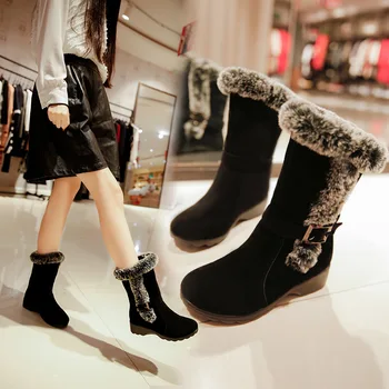 The new fashion trends the dollar head metal decoration with thick warm waterproof antiskid maomao canister boots