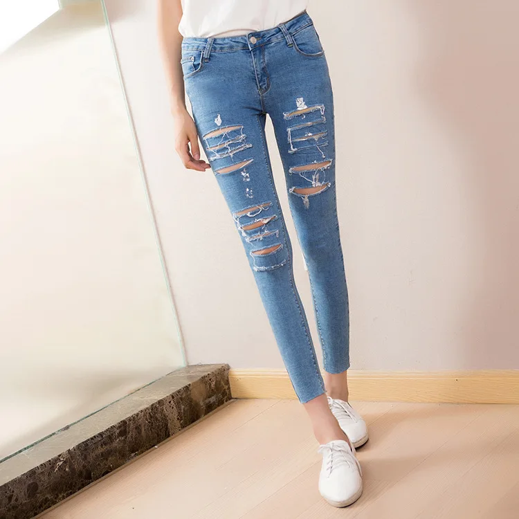 The spring and summer of 2016 Korean female nine silver hot pants tattered jeans girl Slim Pencil jeans