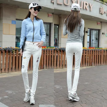 2016 new female Korean stretch jeans slim pencil pants white hole feet badge embroidery